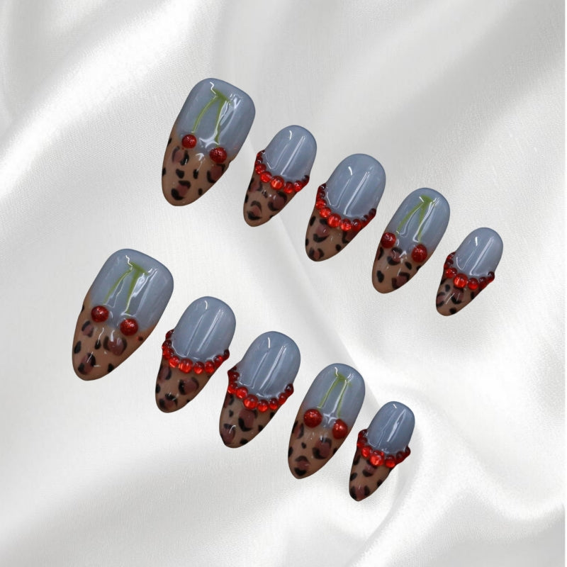 Leopard Print Press-on Nails with Cherry and Red Rhinestone Details