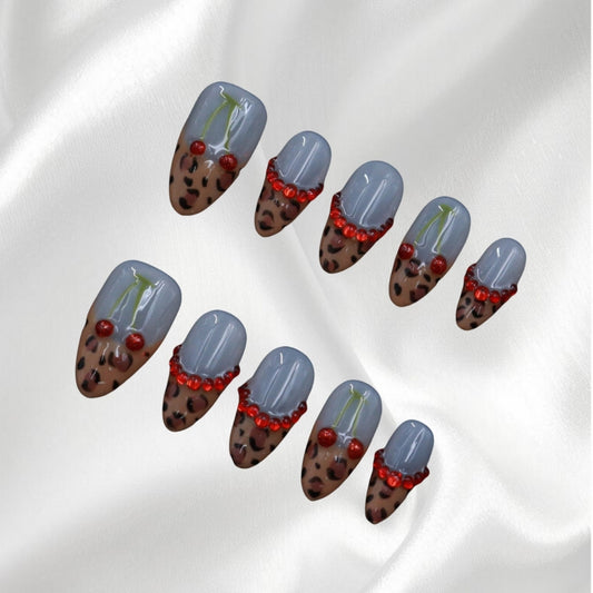 Leopard Print Press-on Nails with Cherry and Red Rhinestone Details
