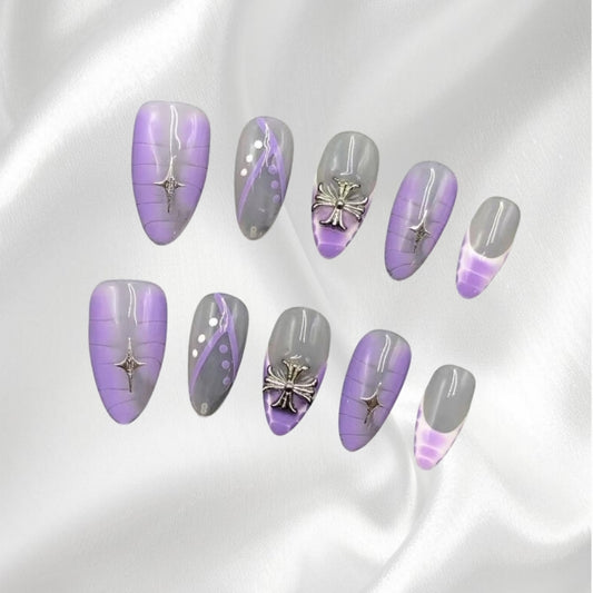 Enigmatic Gothic Purple Almond Press-on Nails with Silver Cross and Star Accents