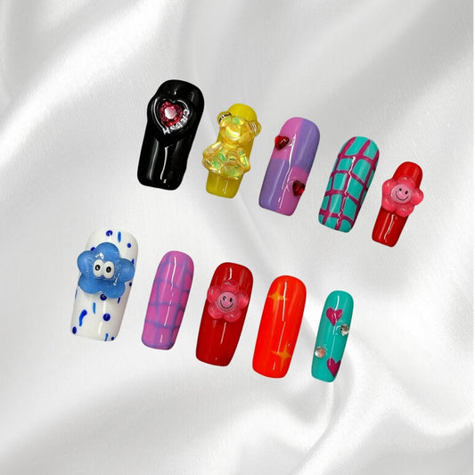 Colorful Cartoon Style Press-on Nails with 3D Charms Playful and Cute Nail Art