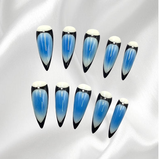 Blue Ombre Stiletto Press-on Nails with Black Accents and Rhinestones